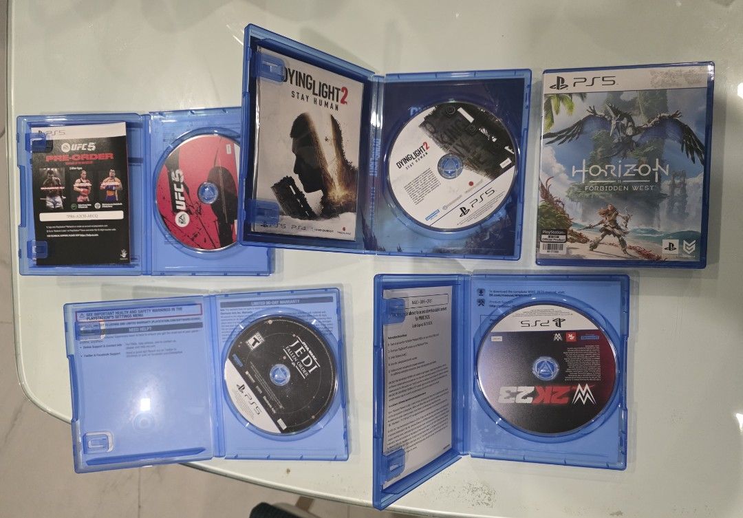 PS5 Games (Category: PlayStation) located in Taguig. Submitted by amazingjyc (Listing ID 1386364487, Image 2). Description: Bundled 5 games 1. Horizon Forbidden West (Sealed) 2. Dying Light 2 3. UFC 5 4. W2K23 5. Star Wars Jedi Fallen Order All original and in good condition. 1st owner. RFS: Finished playing..