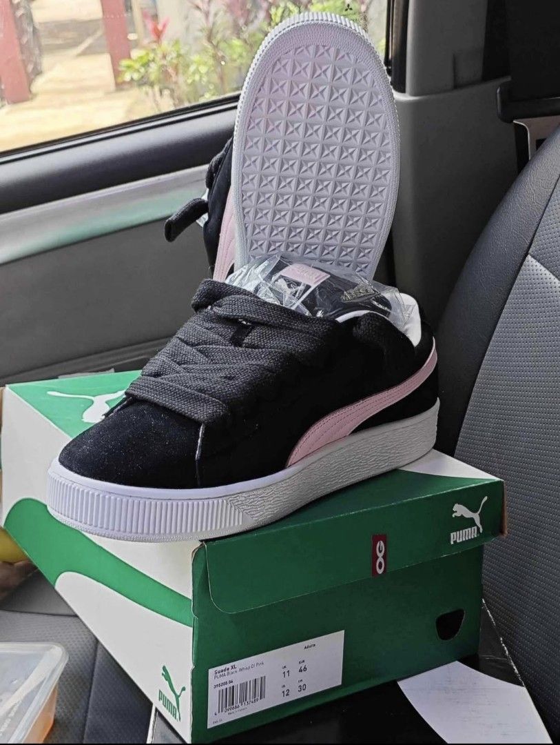 Puma Suede XL size 12US 46EU (Category: Sneakers) located in Makati City. Submitted by agidagoo (Listing ID 1386319294, Image 1). Description: Bought in SG (OG store) Color Black with whisp of Pink Brand new with box, comes with two pairs of shoe laces (one black, one white) Hard to find color, even harder to find in this size. Selling because too narrow for my feet.