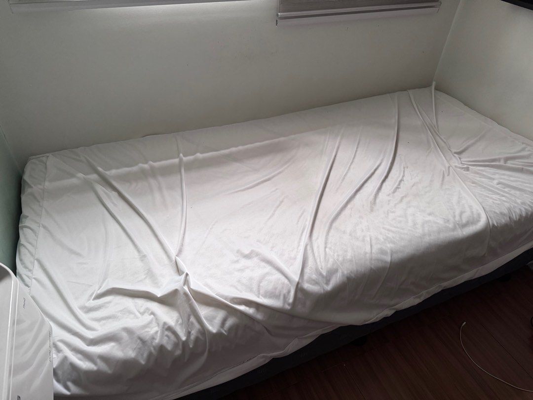 RUSH SALE SINGLE BED SET (Category: Bed Frames & Mattresses) located in Las Pinas. Submitted by zennith_maximus (Listing ID 1386264170, Image 2). Description: Selling our pre-loved Mandaue frame and foam Single bet set. Includes: 1 Bed Frame 1 Matress 1 Spill proof Matress cover Buyer shoulders shipment. Item from Las Piñas area. SMS me for faster transaction RFS: Upscale.