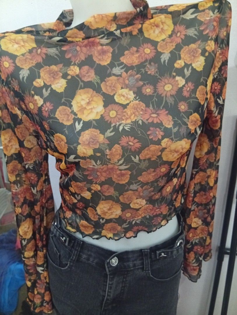 SheIn floral blouse long sleeves (Category: Longsleeves) located in Caloocan City. Submitted by celinesrtw (Listing ID 1386296484, Image 1). Description: floral top semi see thru medium on tag.