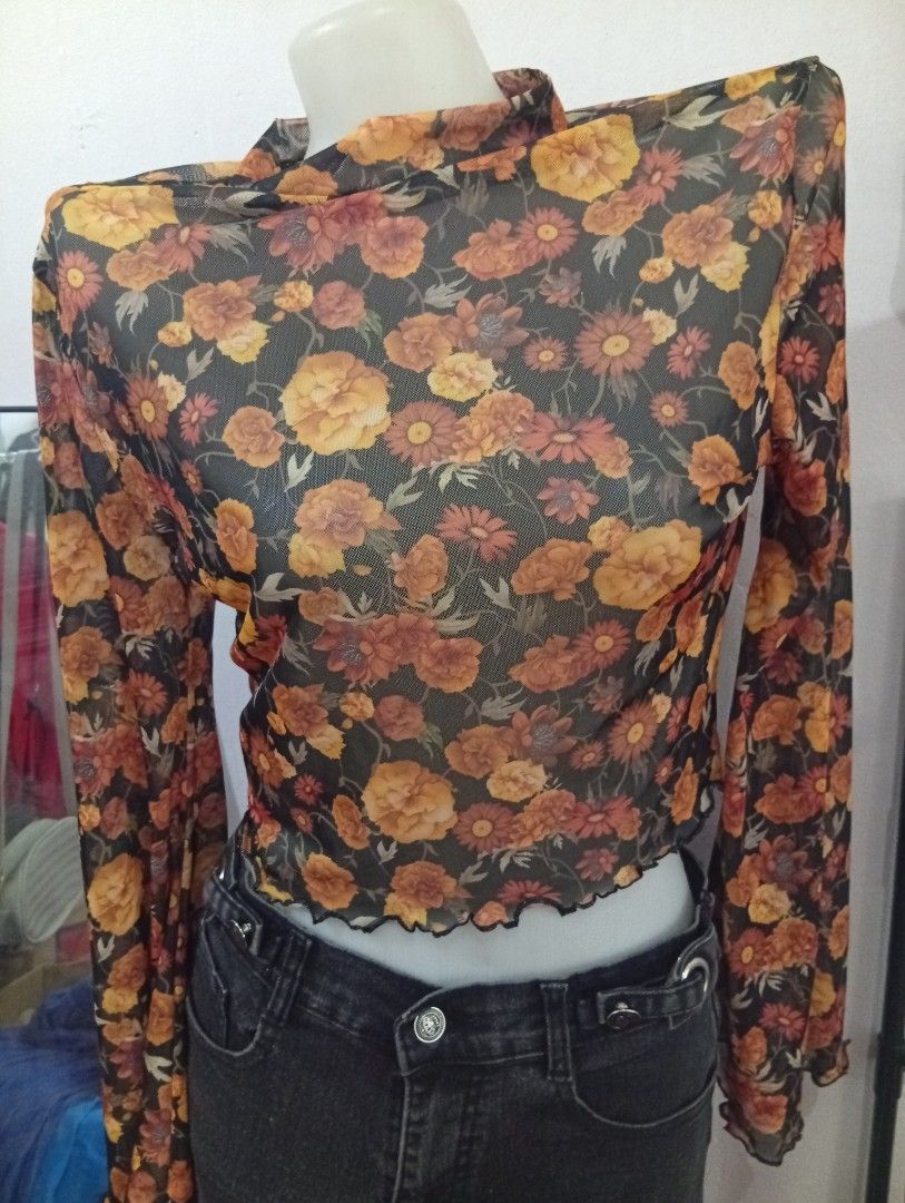 SheIn floral blouse long sleeves (Category: Longsleeves) located in Caloocan City. Submitted by celinesrtw (Listing ID 1386296484, Image 2). Description: floral top semi see thru medium on tag.