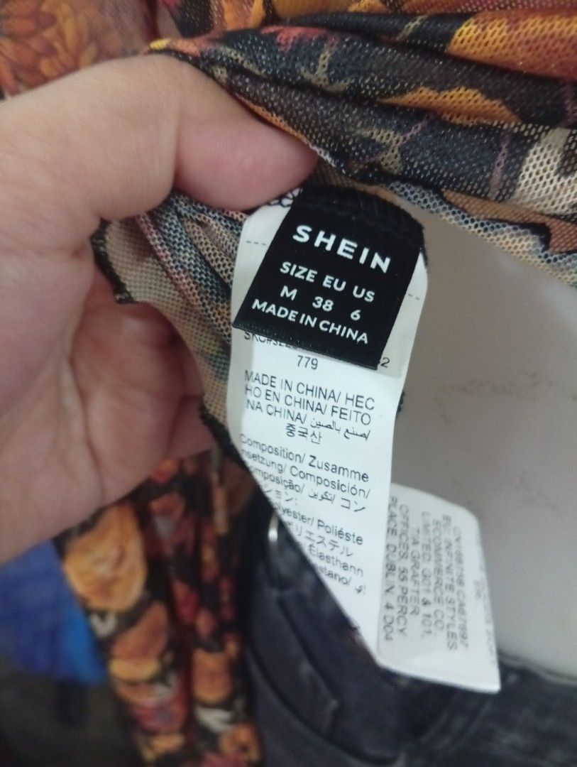 SheIn floral blouse long sleeves (Category: Longsleeves) located in Caloocan City. Submitted by celinesrtw (Listing ID 1386296484, Image 3). Description: floral top semi see thru medium on tag.