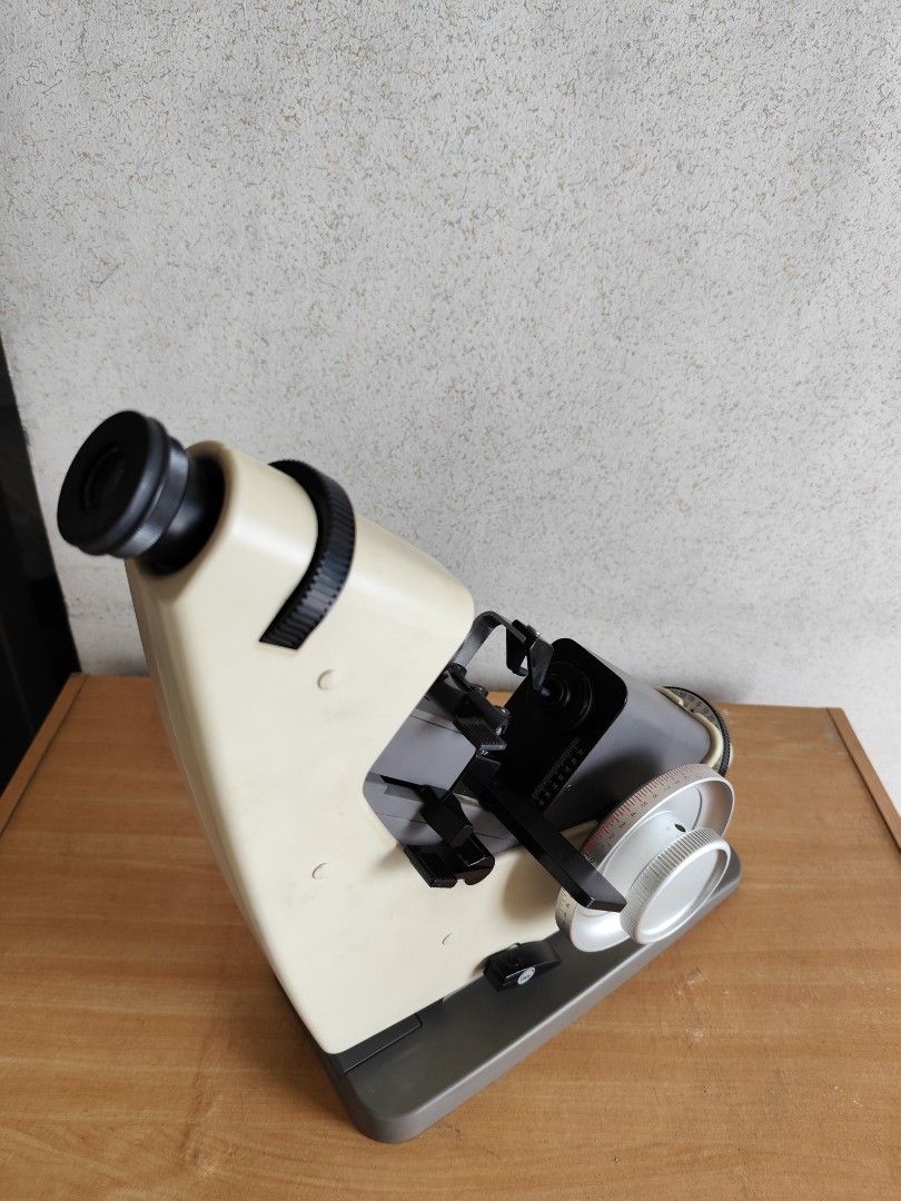 Shin Nippon Lensmeter LM-15B optical (Category: Medical Supplies & Tools) located in Manila. Submitted by grace.fu (Listing ID 1386295476, Image 1). Description: The Shin Nippon Lensmeter LM-15B is a manual focimeter manufactured in Japan by Shin Nippon (a brand now owned by Rexxam), designed to measure the optical power of eyeglass lenses. It features a cordless design, an LED light source that eliminates bulb replacement, auto power-off for bat