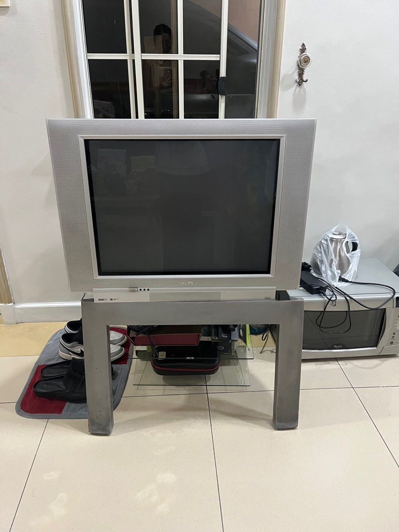 Vintage Philips TV with glass stand (Category: TV) located in San Juan City. Submitted by mvl27 (Listing ID 1386334202, Image 1). Description: No remote. As is Buyer pays for shipping.