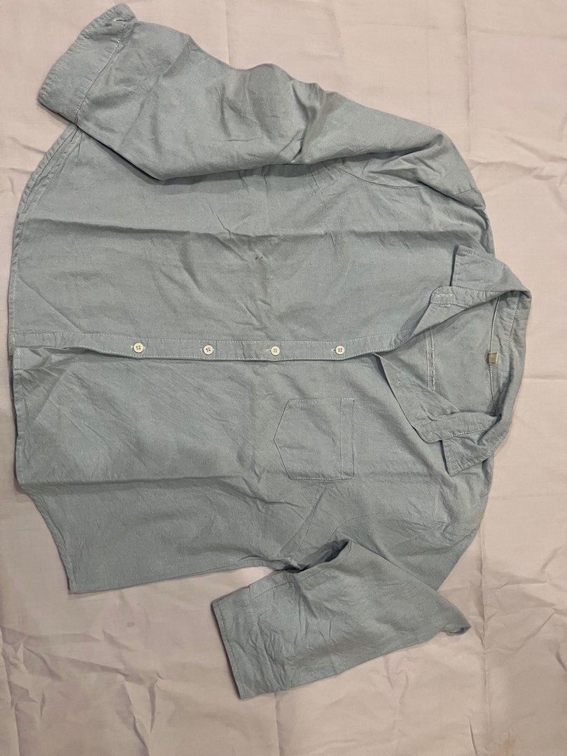 Work shirt (Category: Shirts) located in Shah Alam. Submitted by del0711 (Listing ID 1386230708, Image 1). Description: Reason for selling : Wardrobe clearance Material : Cotton Item is nicely kept. Condition is good. Length : 61 cm Width : 55 cm .