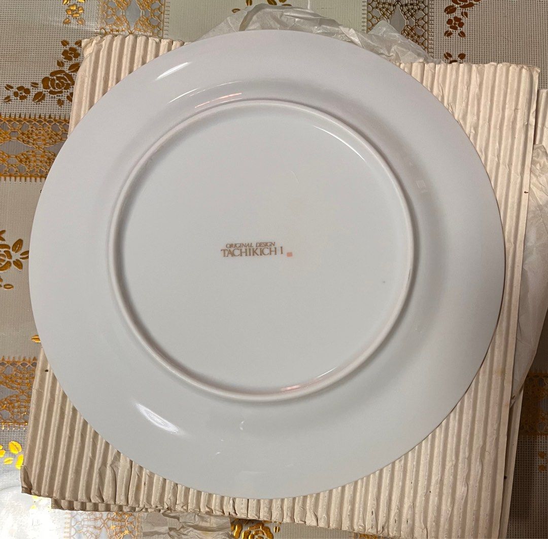 Adam & Eve Tachikichi Plates - 5 pcs. (Category: Dinnerware & Cutlery) located in Malabon City. Submitted by twinklevir (Listing ID 1386422335, Image 2). Description: 5 pcs. adam & Eve Tachikichi Plates With Box Brand new Size - 7 1/2 inches The plate in the image features a white base with a prominent dark blue band and a thin gold rim.