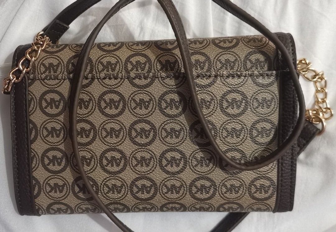 Anne Klein Sling Wallet or Wallet on Chain (Category: Cross-body Bags) located in Quezon City. Submitted by emti88 (Listing ID 1386457330, Image 2). Description: Anne Klein Sling Wallet or Wallet on Chain Brand new and original Espresso color 8 card slots.