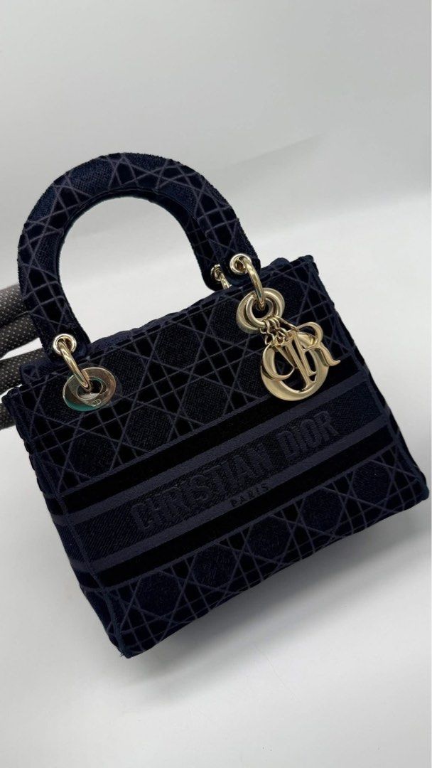 Authentic Christian dior d-lite blue velvet (Category: Luxury Bags & Wallets) located in Quezon City. Submitted by jhaediah (Listing ID 1386587069, Image 3). Description: Christian dior d-lite blue velvet excellent condition no flaws with card,booklet, dustbag & entrupy!.