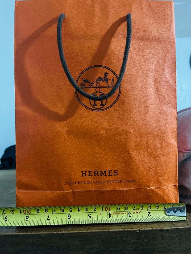 Authentic Hermes Paper Bag (Category: Luxury Accessories) located in Mandaluyong City. Submitted by rian.declutter (Listing ID 1386579525, Image 2). Description: Money back if fake Got this from a friend from Korea 11.25x8.25x3.5 Fixed price .