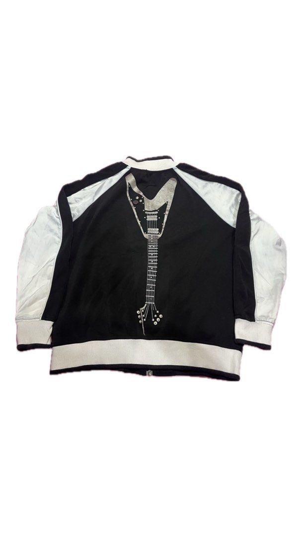 black and white jacket (with electric guitar design) (Category: Coats, Jackets and Outerwear) located in Caloocan City. Submitted by estrobewy (Listing ID 1386568465, Image 2). Description: need wash.