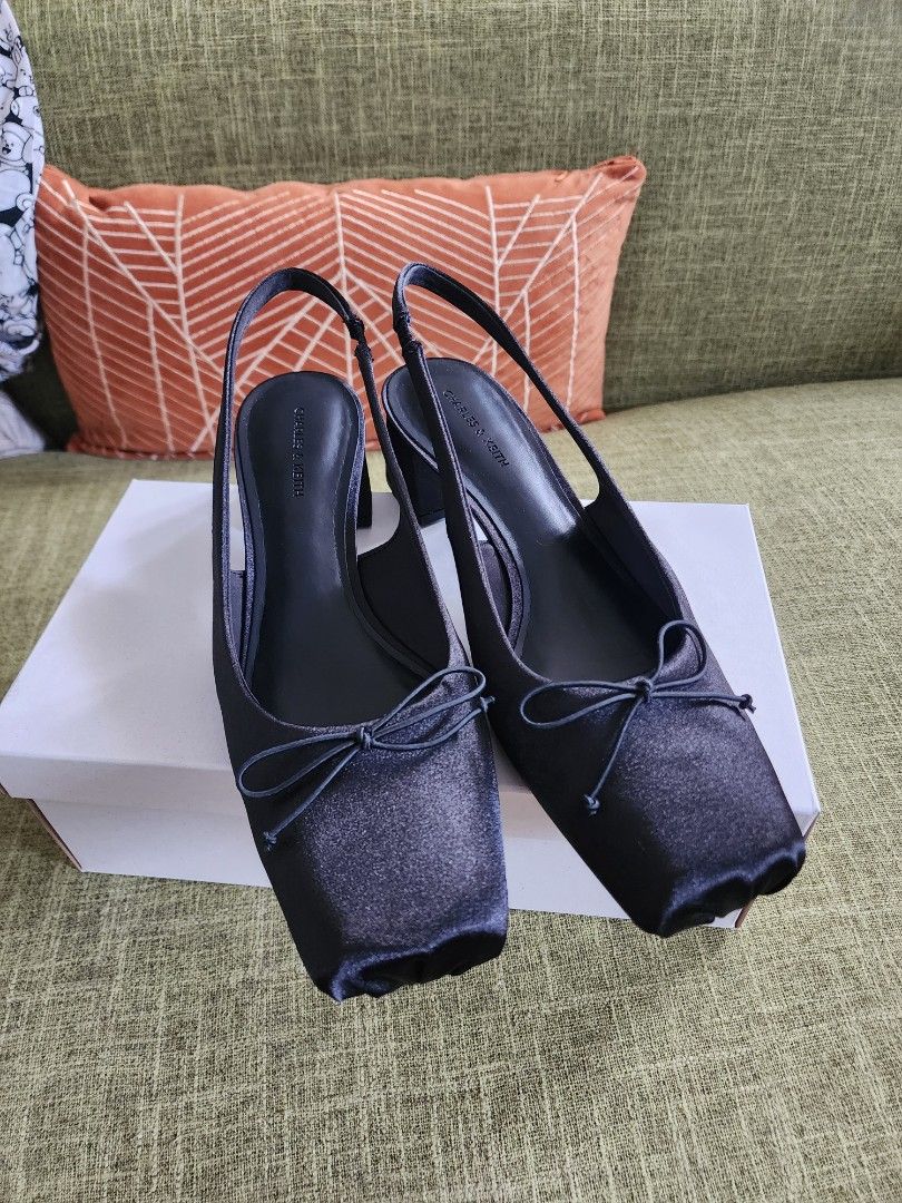 Black Satin Bow Heels (online exclusive style) (Category: Heels) located in Manila. Submitted by stylesister_ (Listing ID 1386437266, Image 1). Description: Worn once 🖤 Elite Sandy Liang dupe! Ordered from SG RFS: Fit doesn't look nice on me 💔 Best for ladies with narrow feet.