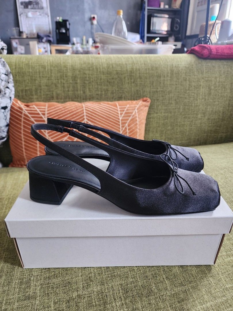 Black Satin Bow Heels (online exclusive style) (Category: Heels) located in Manila. Submitted by stylesister_ (Listing ID 1386437266, Image 2). Description: Worn once 🖤 Elite Sandy Liang dupe! Ordered from SG RFS: Fit doesn't look nice on me 💔 Best for ladies with narrow feet.