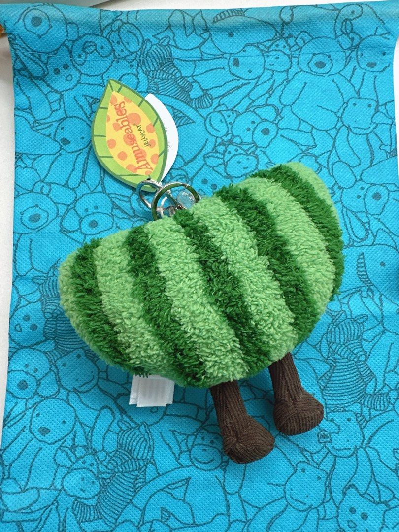 Bnew Original Jellycat Amuseable Watermelon Keychain Charm (Category: Plushies & Soft Toys) located in Davao. Submitted by misisnijungkook (Listing ID 1386520221, Image 2). Description: Bnew On hand and ready to Ship NO HAGGLING, Fixed price no last price - Bring a slice of joy to everyday life with the Jellycat Amuseable Watermelon Bag Charm Keyring! This adorable 3.5-inch fruit slice plush toy features a cheerful, smiling watermelon design, com