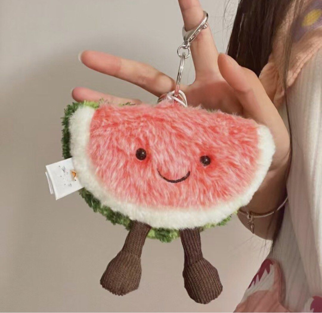 Bnew Original Jellycat Amuseable Watermelon Keychain Charm (Category: Plushies & Soft Toys) located in Davao. Submitted by misisnijungkook (Listing ID 1386520221, Image 3). Description: Bnew On hand and ready to Ship NO HAGGLING, Fixed price no last price - Bring a slice of joy to everyday life with the Jellycat Amuseable Watermelon Bag Charm Keyring! This adorable 3.5-inch fruit slice plush toy features a cheerful, smiling watermelon design, com