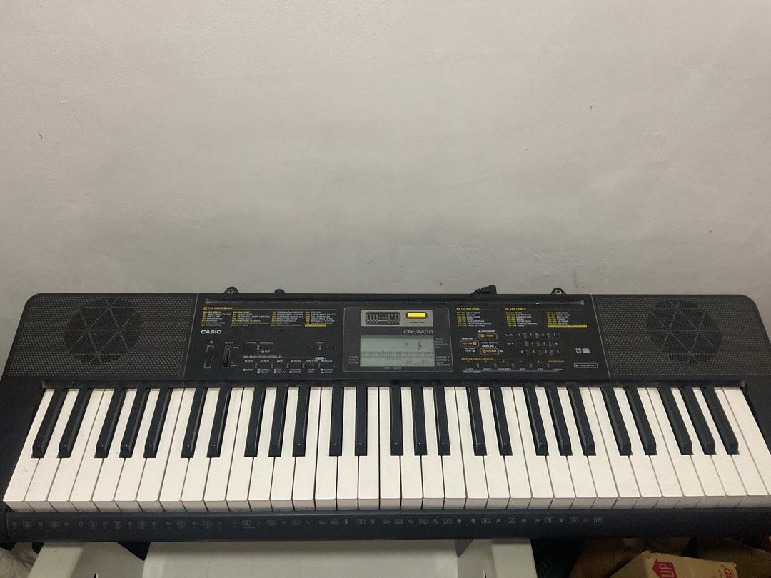 Casio CTK-2400 61-key Portable Keyboard (Category: Musical Instruments) located in Tarlac. Submitted by gelo.morningstar (Listing ID 1386559808, Image 2). Description: Specifications: 61 Full-Size Keys 400 AHL Tones & 150 Rhythms Built-in Sampling Function Step-Up Lesson System 48-Note Polyphony & 110 Built-in Songs USB MIDI Connectivity Inclusions: Keyboard Stand Sustain Pedal Adapter (Power Plug).
