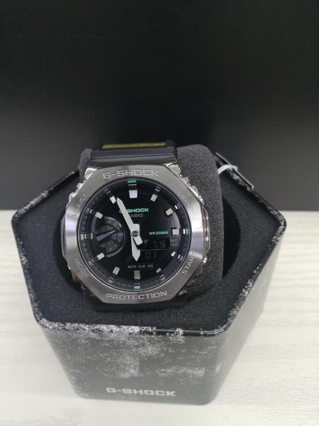 Casioak Gshock GM2100CB-3 GM2100CB-3A (Category: Men's Watches) located in Manila. Submitted by seikowatchfactory (Listing ID 1263801879, Image 2). Description: Brand New in Box Authentic Gshock 10/10 Model: GM2100CB-3A Price: 9500 pesos Specifications: Case Size: 49.3 x 44.4 x 11.8mm Case and Bezel Material: Resin/Stainless Steel Shock Resistant Approx. battery life: 3 years on SR726W x 2 Weight: 72g Cloth Band 200m Water Resistance Mineral Glas