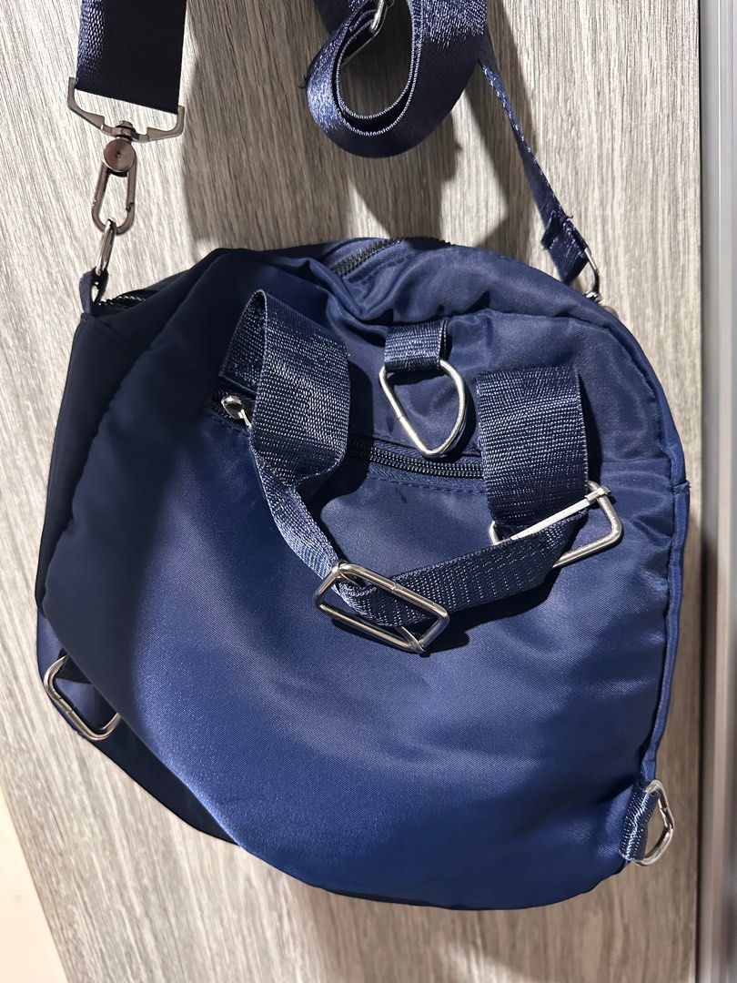 Crossbody bag and Backpack (Category: Luxury Bags & Wallets) located in Iloilo. Submitted by aekenshield (Listing ID 1386515105, Image 2). Description: > Blue Bag ₱200 Can be use as sling or shoulder bag. Bought in Vietnam Market > Black Backpack ₱ 200 Issue: No zipper in front (refer to the picture shown) Old but material is good. > Buy two bags for ₱ 350 In good condition. Seldom use. Mostly stored lang. RFS: Declutterring.