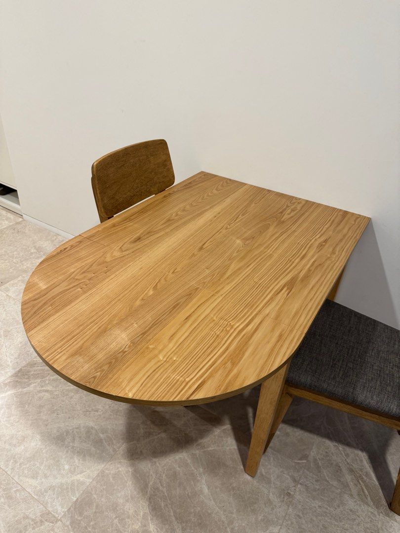 Dining Table (Category: Tables & Sets) located in Singapore. Submitted by tracealot (Listing ID 1386513941, Image 2). Description: Like new set of dining table and two chairs. Dining table can be extended for additional space. 0.75 x 1.15m From HipVan, original price $399. .