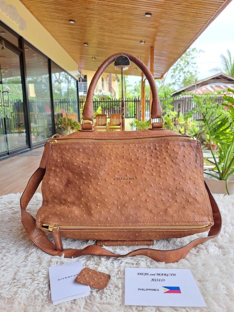 Givenchy Pandora Large in Brown Ostirich Leather Bag (Category: Luxury Bags & Wallets) located in Tagum. Submitted by luxestreetbags (Listing ID 1386406257, Image 2). Description: 💠💠💠 Authentic/Original 💠💠💠 Givenchy Pandora Large in Brown Ostrich Leather Bag, Pre-owned‼️‼️👜👜 Made in Italy With code Ykk zippers Inclusions: Carebook and Leather sample ➕️ shipping fee depends on the country through DHL but of the moment we use EMS due to DHL
