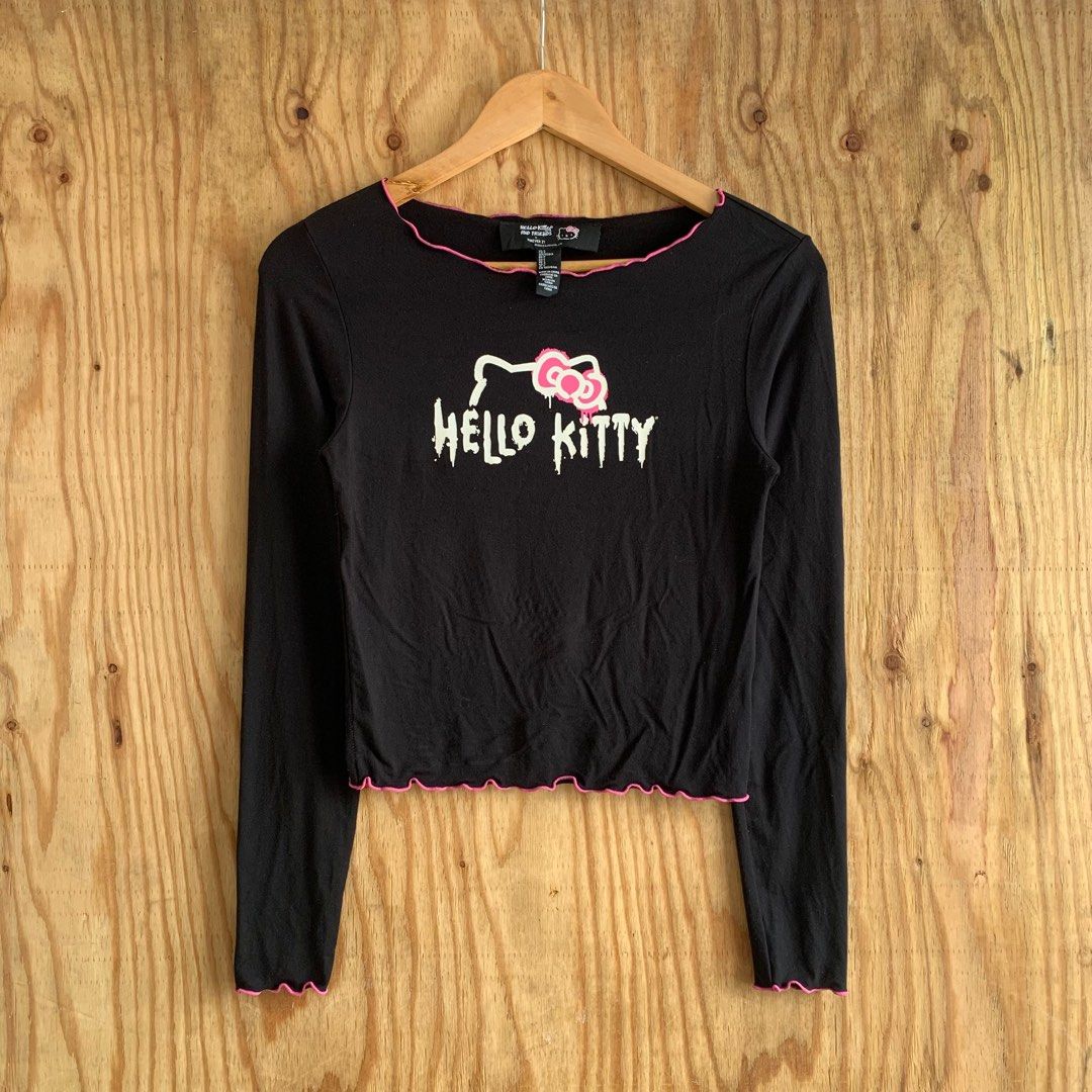 HELLO KITTY X FOREVER 21 LONGSLEEVE HELLO KITTY (Category: Longsleeves) located in Manila. Submitted by _thrift.gal (Listing ID 1386524778, Image 3). Description: HELLO KITTY X FOREVER 21 LONGSLEEVE HELLO KITTY Size: S Width: 13 Length: 19 Color Rate:10/10 Condition:Excellent Issues: None.