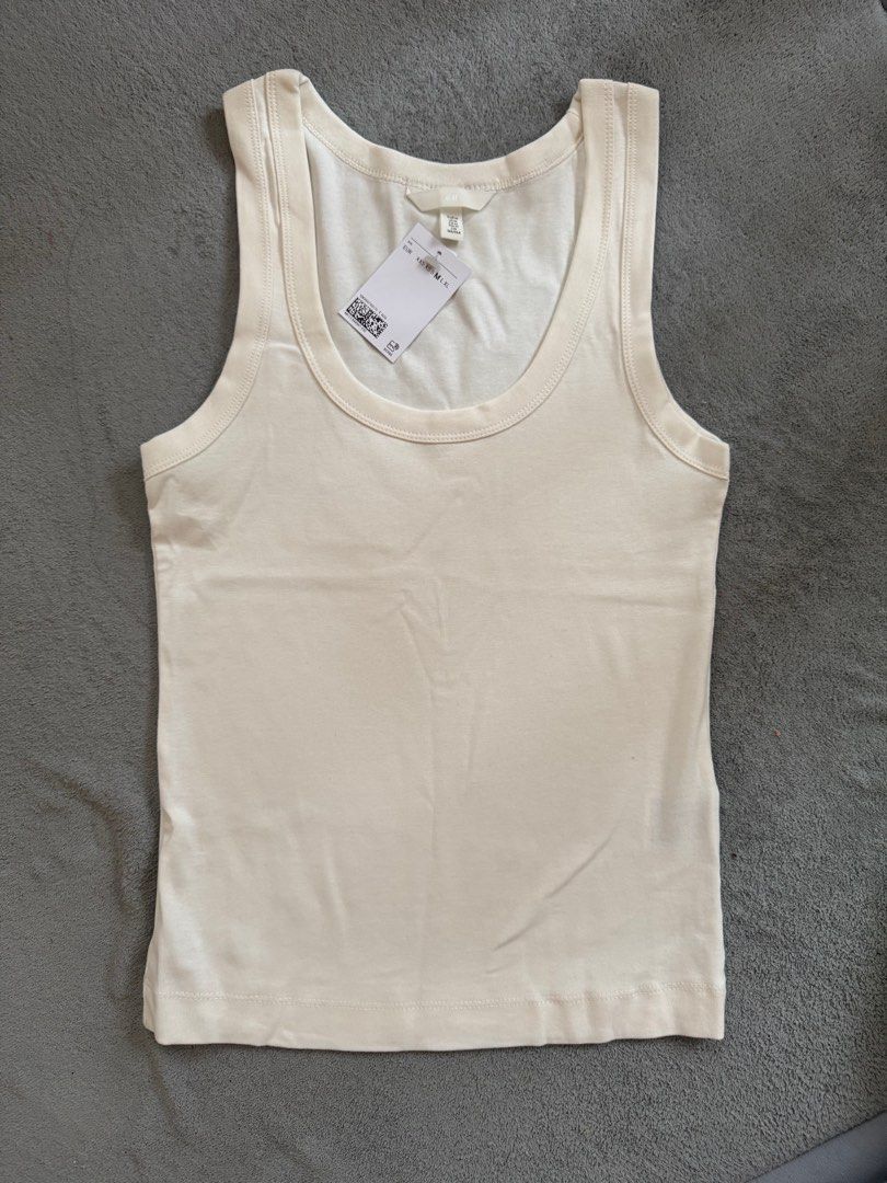 H&M Fitted Tank Top Cream/Ecru (Category: Sleeveless) located in Bocaue. Submitted by arnssss (Listing ID 1386418656, Image 1). Description: Brand new with tags, never worn. Rfs - wrong size.