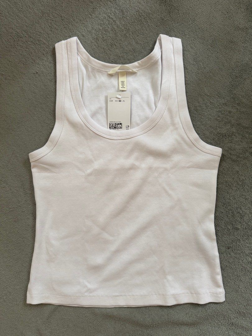 H&M Ribbed Tank Top White (Category: Sleeveless) located in Bocaue. Submitted by arnssss (Listing ID 1386418904, Image 1). Description: Brand new with tags. Never worn. Rfs - wrong size.