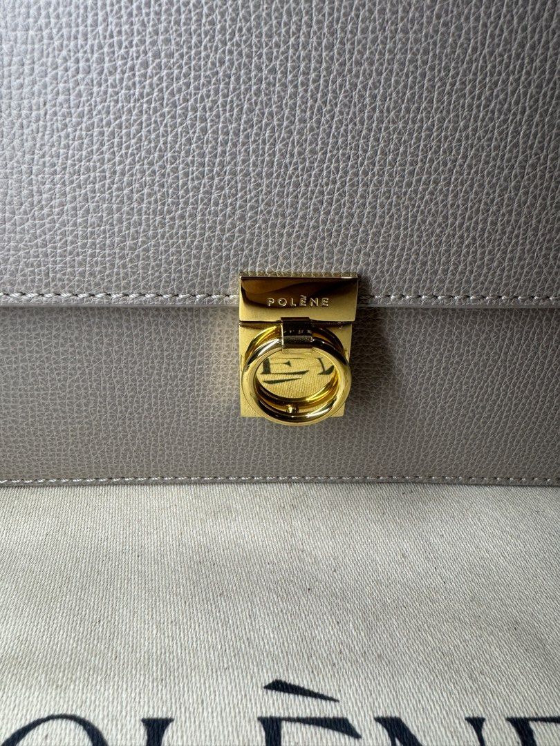 Like New Authentic Polene Numéro Sept Taupe with Dustbag & Tag/Care Card (Category: Luxury Bags & Wallets) located in Quezon City. Submitted by greatgoodies03 (Listing ID 1386442224, Image 3). Description: - Gold Hardware [GHW] - Certified Italian textured calf leather. - Can be Handbag, shoulder bag, or crossbody bag. - Dimensions: 23 X 21 X 12 cm. - Interior pocket. Bought in Europe Location is in qc near ayala cloverleaf and banawe Sf on buyer