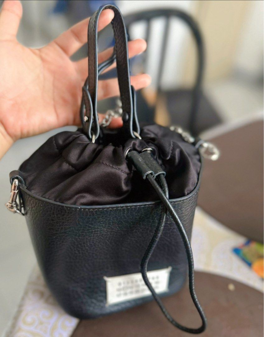 Maison Margiela | Bucket Bag | small (Category: Luxury Bags & Wallets) located in Manila. Submitted by preloved.brand2023 (Listing ID 1386405546, Image 2). Description: From south Korea. With white tag and code.