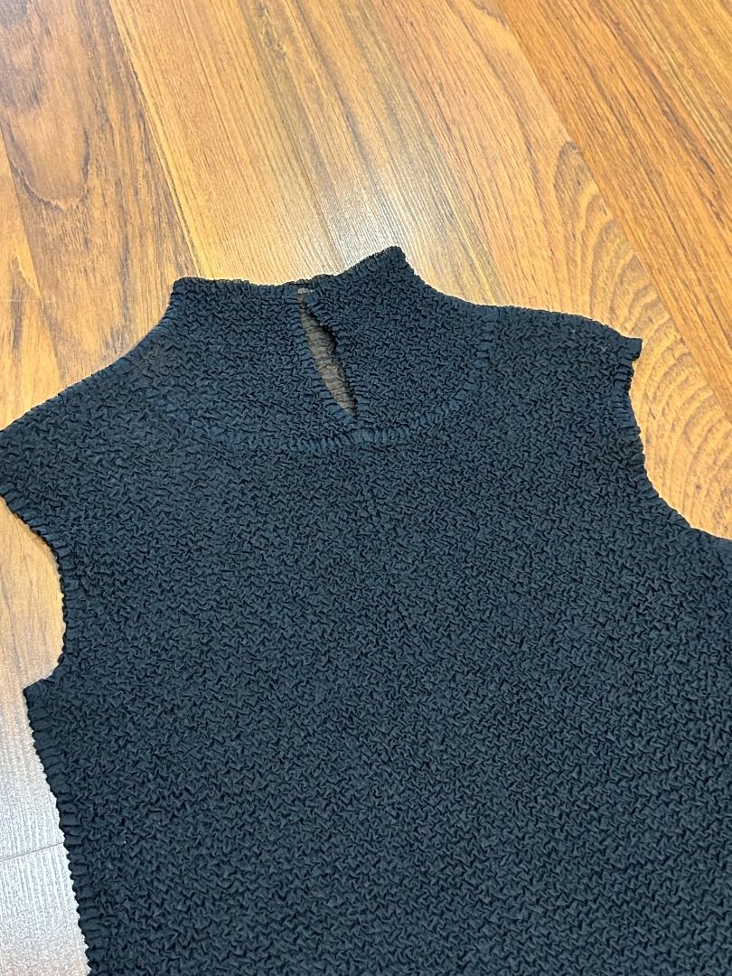 Miradolé la Maison Sheer Top (Category: Blouses) located in Quezon City. Submitted by martits (Listing ID 1386450389, Image 2). Description: Stretchy textured sheer black sleeveless top with mock neck design. Lightweight and breathable. Layer over bralettes or under blazers for edgy or office chic looks..