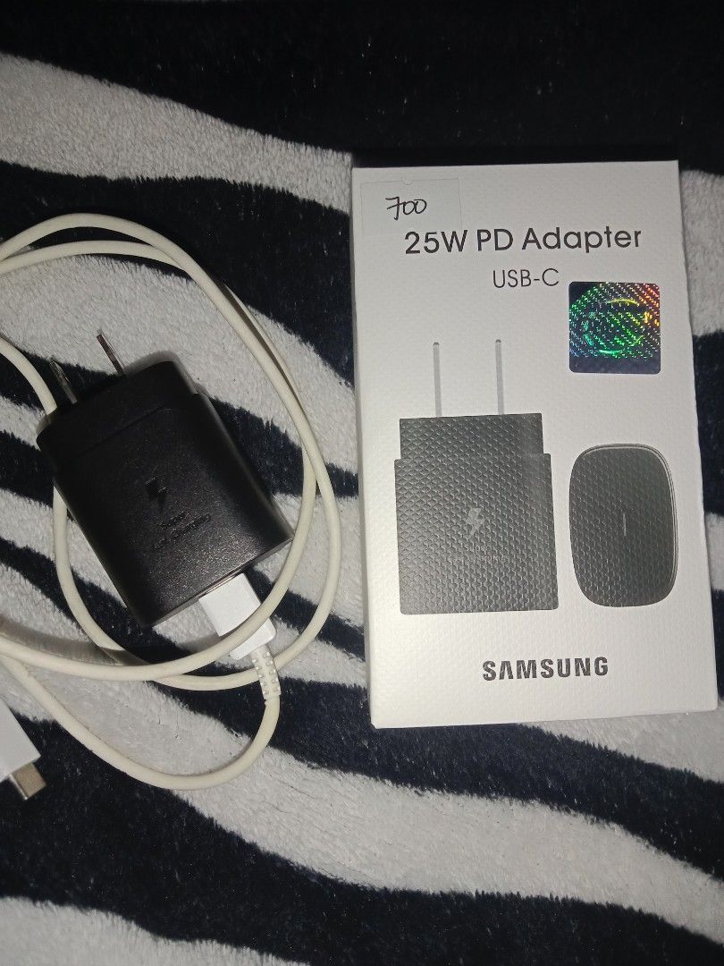 Original Samsung Charger & Adaptor (Category: Chargers & Cables) located in Taguig. Submitted by _itsmargauxfinds (Listing ID 1386556161, Image 2). Description: details about the charger: 💌 lightly used 💌 original and fast charging 💌 it comes with a box and cord 💌 mop: gcash/maya 💌 mod: jnt/lalamove.