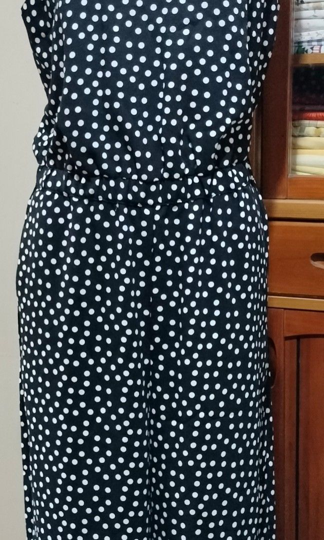 Polkadot black and white jumper (Category: Jumpsuits) located in Quezon City. Submitted by iciafvf (Listing ID 1386432041, Image 2). Description: Loft jumper with pockets 👗 very fine condition like new ♥️ garterized and fully lined Measurements: Bust: 46cm Waist: 36-40cm MOP: Gcash or bank transfer SF c/o buyer kindly, direct message for additional details and pictures..