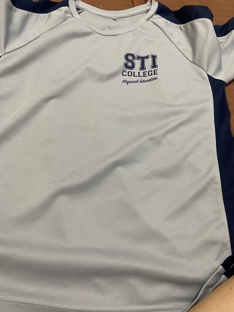 STI Large PE Shirt College (Category: Shirts) located in Manila. Submitted by nullahstore (Listing ID 1386502616, Image 1). Description: STI PE Uniform Large Size for College Student Used for one (1) Semester (girl) rfs: Needs Medium size only .