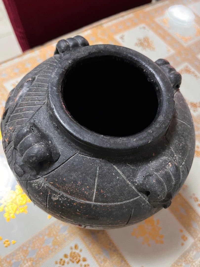 Vintage Claypot Vase with Dragon Design (Category: Vases & Decorative Bowls) located in Malabon City. Submitted by twinklevir (Listing ID 1386418847, Image 2). Description: A copper-red underglazed vase with a dragon motif. It is a Chinese antique yuhuchunping, a pear-shaped porcelain vase with a short foot and slender neck. The vase is adorned with a four-clawed dragon amid swirling clouds, and the rim is decorated with a classic scroll motif. D