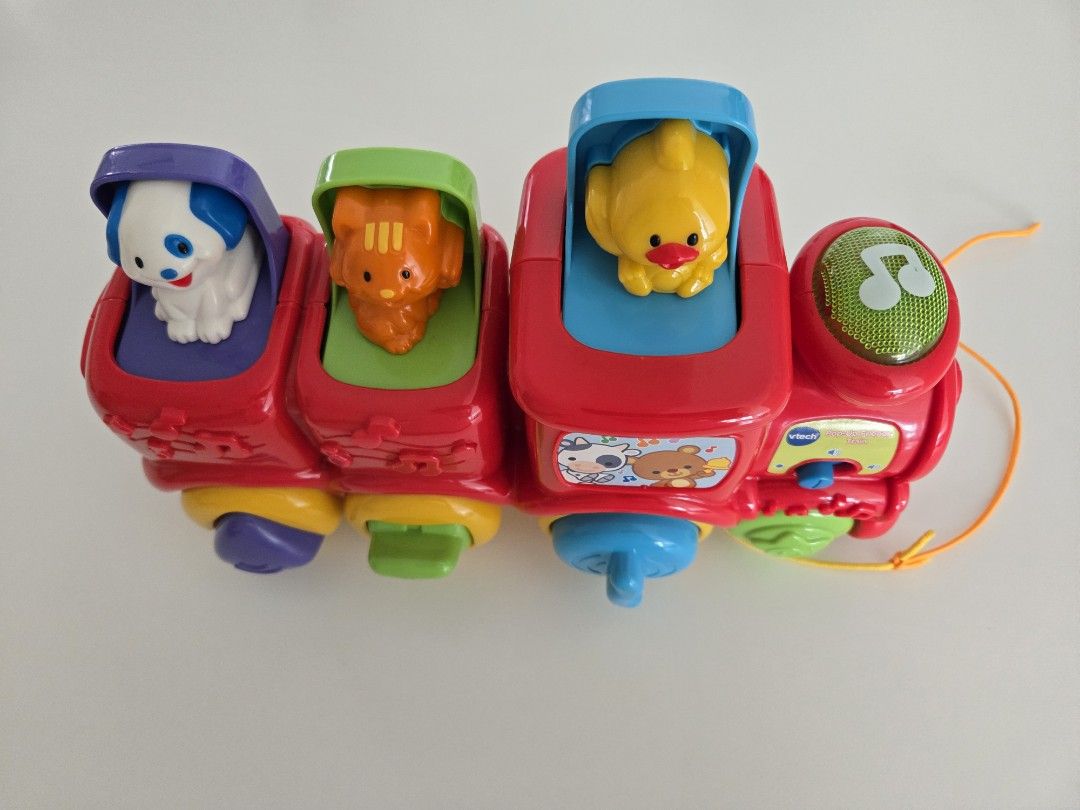 VTech Train (Category: Infant Playtime) located in Singapore. Submitted by damnthemicrophone (Listing ID 1386455063, Image 1). Description: - VTech Sit-to-Stand Train - Perfect for toddlers - Features fun animal characters - Plays musical sounds - In great condition - Includes pull string.