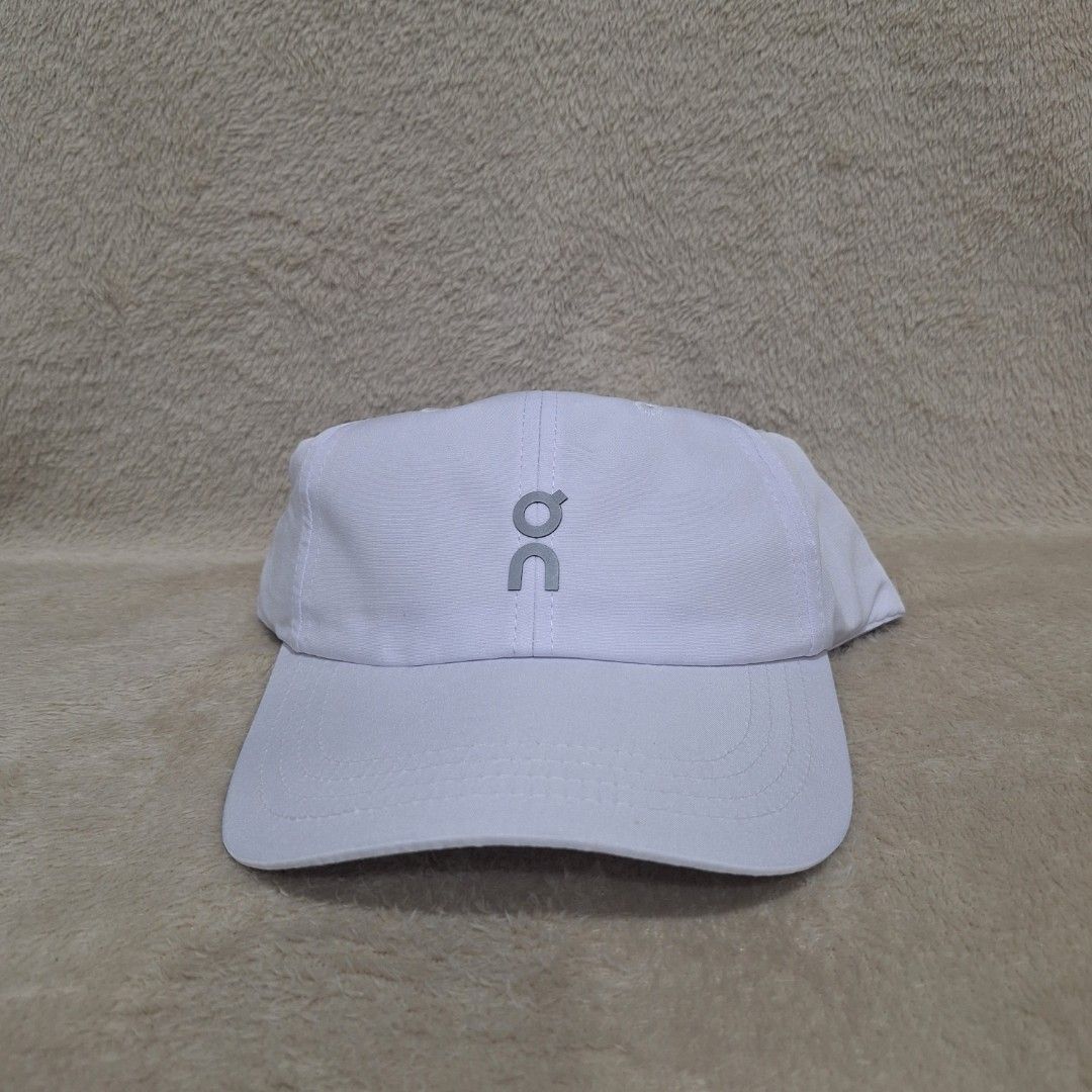 ALL WHITE On logo nylon running cap/hat by On Cloud / ON (Category: Hats & Beanies) located in Balagtas. Submitted by capncaps09 (Listing ID 1386762881, Image 2). Description: ALL WHITE On logo nylon running cap/hat by On Cloud / ON Brand new legit 100% 950.