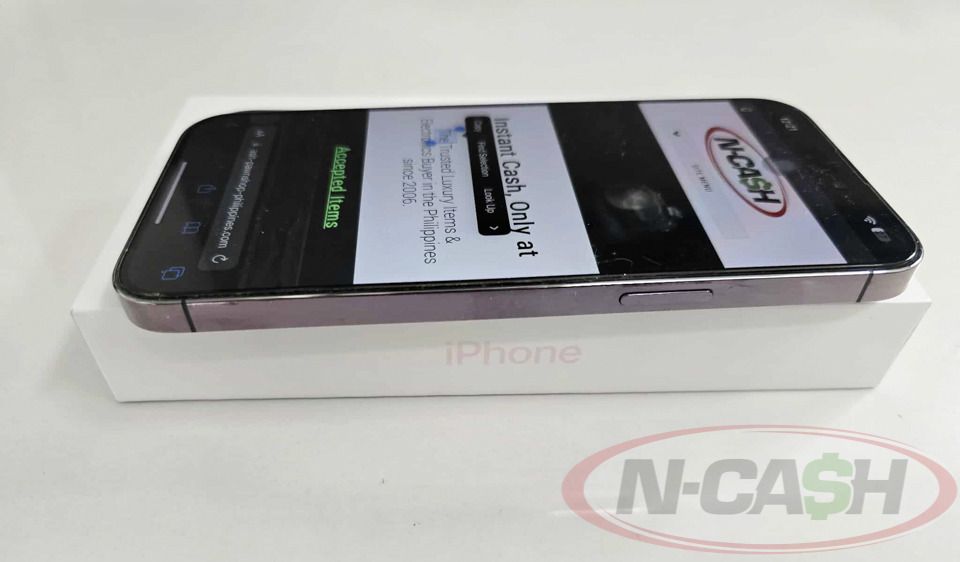 Apple iPhone 14 Pro Max (Category: iPhone 14 Series) located in Makati City. Submitted by luxury_by_ncash_2 (Listing ID 1386679154, Image 3). Description: N-Cash Pawnshop "Instant Cash for Bags, Watches, Cars, and Electronics" https://www.ncash-pawnshop-philippines.com/ Apple iPhone 14 Pro Max MQ9T3ZP/A Deep Purple 128GB Factory unlocked Local unit Appearance is around 9 out of 10. Minor fading on the chrome sidings only. Otherwise, like new. Bat