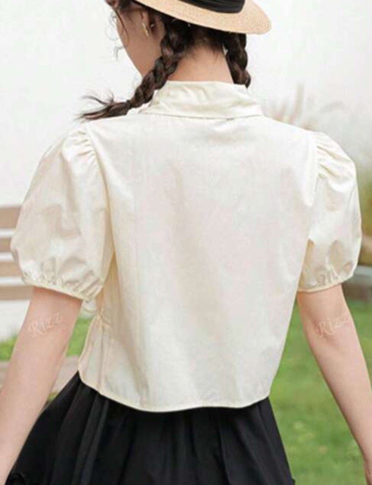 Apricot Cropped Polo Coquette Top (Category: Blouses) located in San Pablo. Submitted by eli.stuff (Listing ID 1386747606, Image 2). Description: OG Price: 361 Size: S measurements-last slide.