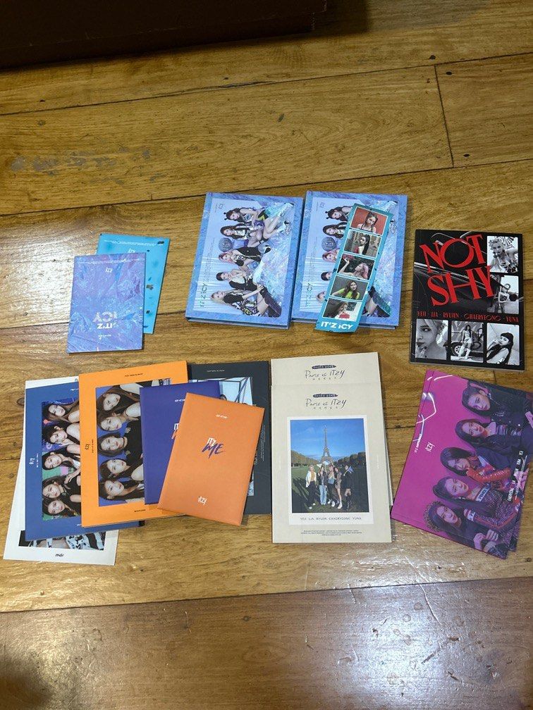 Assorted ITZY Albums / Booklets (Category: CDs & DVDs) located in Quezon City. Submitted by any.every (Listing ID 1386691178, Image 1). Description: WYSIWYG take all for 1k comes with postcard sets, booklets, 6 albums, stickers.