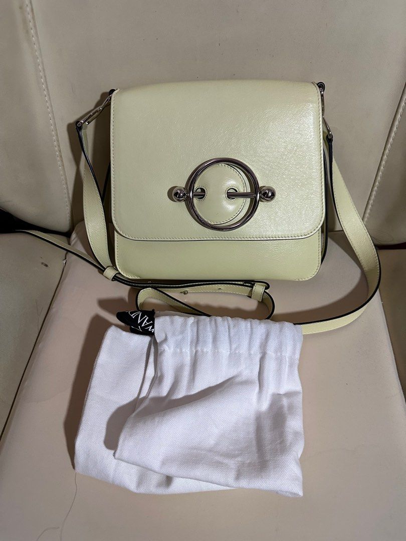 Authentic JW Anderson Disc Bag in Yellow (Category: Shoulder Bags) located in Antipolo. Submitted by jalzooby (Listing ID 1386612427, Image 1). Description: Selling my authentic JW Anderson Disc Bag in Yellow Calf Leather Dimensions: H: 21cm x W: 24cm x D: 10cm. Strap Drop: 60cm. Almost new.
