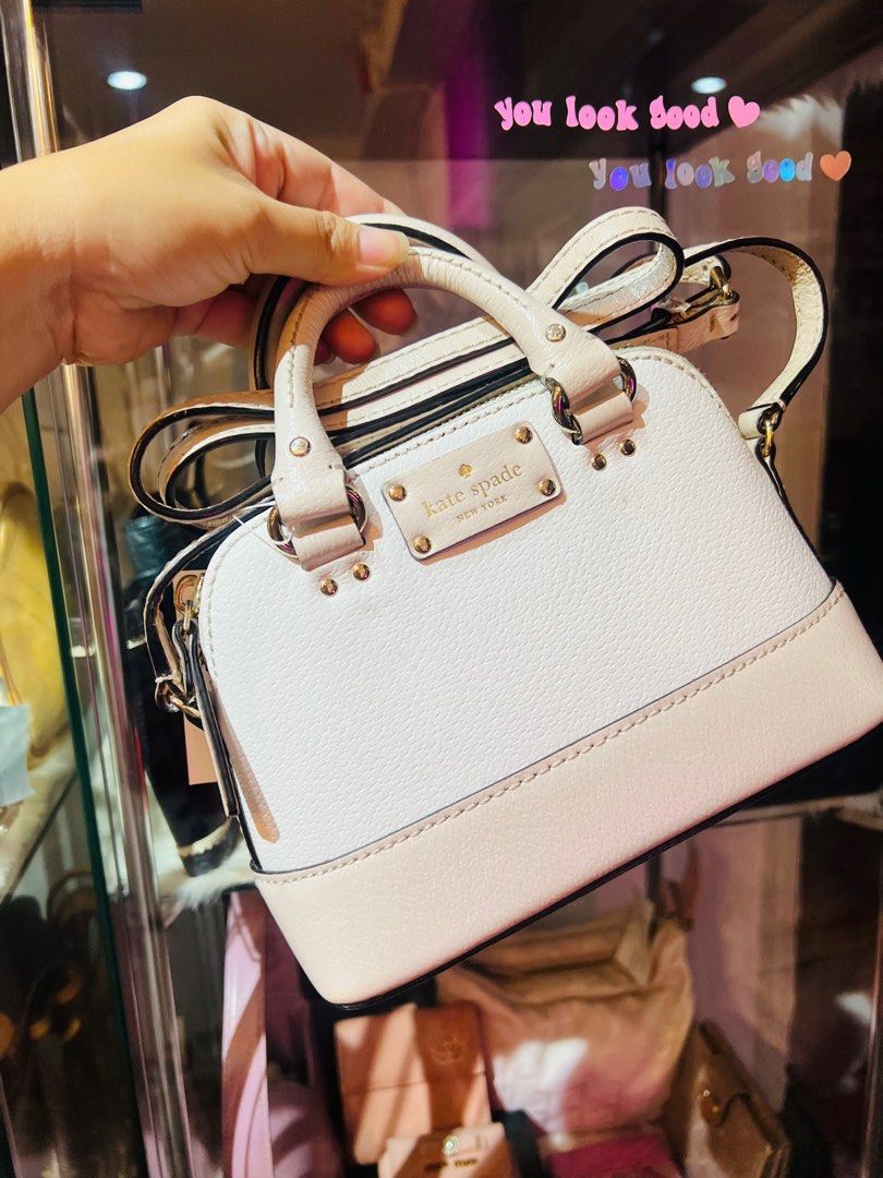 Authentic Kate Spade Mini Dome Two-Way Bag (Category: Luxury Bags & Wallets) located in Dumaguete. Submitted by lovebags.ph (Listing ID 1386760062, Image 1). Description: Fits your promax phone super pretty!.