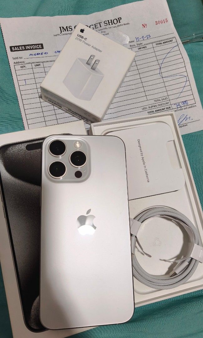 Iphone 15 Pro Max 256GB White Titanium Dual Sim HK Variant (Category: iPhone 15 Series) located in Makati City. Submitted by itsmedimple (Listing ID 1386742338, Image 2). Description: Iphone 15 Pro Max 256GB White Titanium Openline (Any sim will do) Dual physical sim Complete with receipt TG installed since day 1 Inclusions: Original Type C Cable (unused), Box (Same IMEl), Sim Ejector Pin, Lots of phone case Adapter & Receipt No history of repair