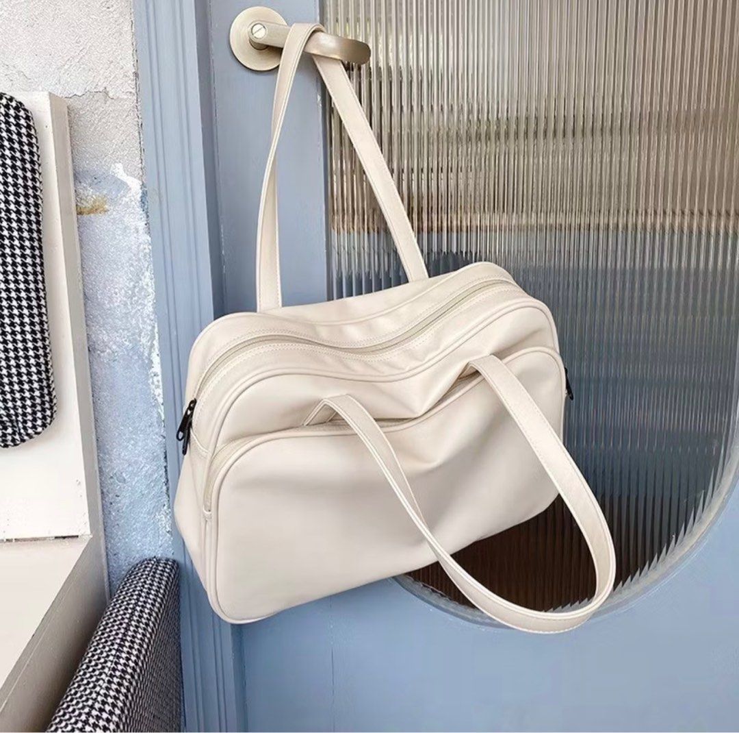 Large Capacity Tote/ School Bag (Category: Shoulder Bags) located in Manila. Submitted by reignix (Listing ID 1386740425, Image 1). Description: Color: White Capacity: Large, kasya 15 inch laptop RFS: Decluttering.