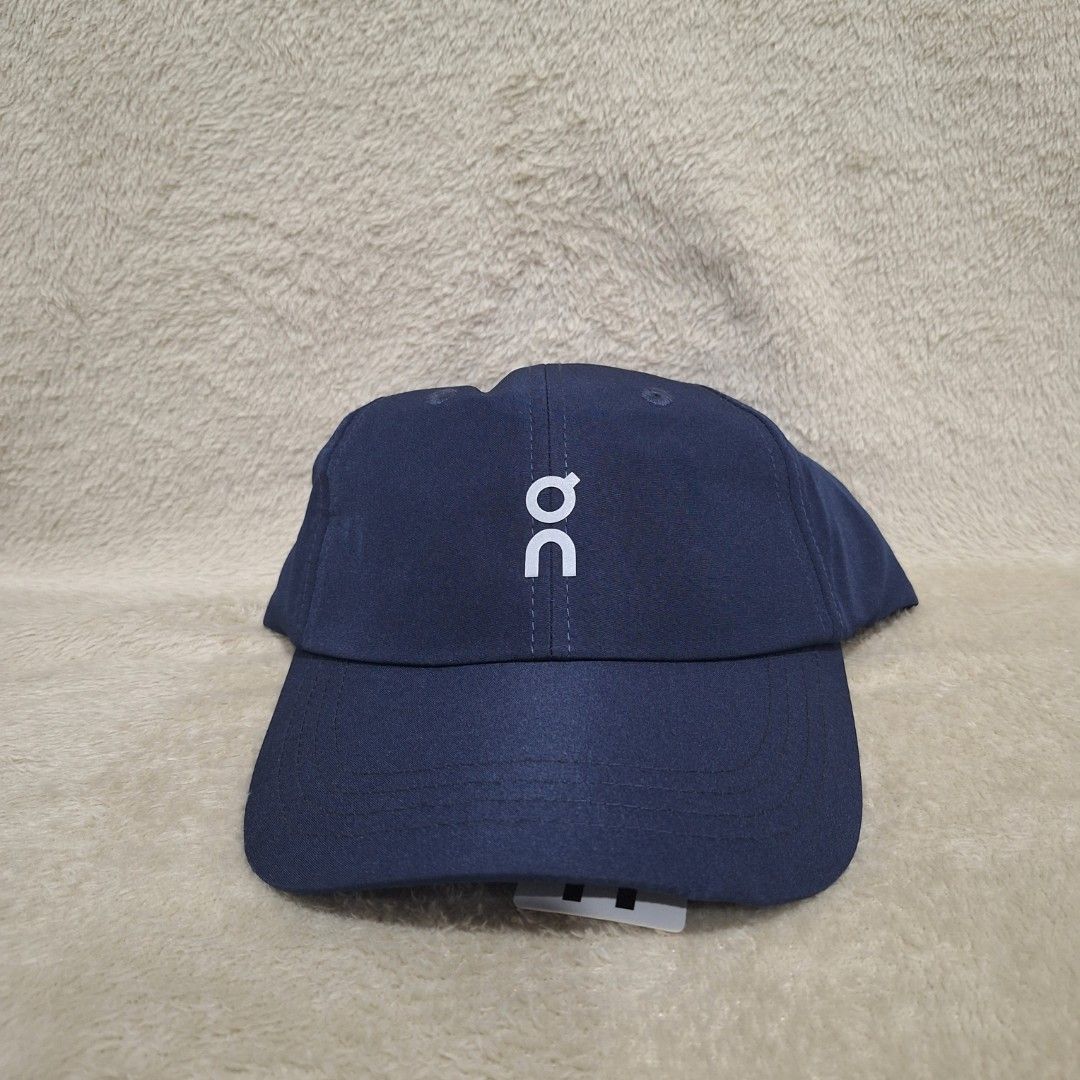 NAVY BLUE On logo nylon running cap/hat by On Cloud / ON (Category: Hats & Beanies) located in Balagtas. Submitted by capncaps09 (Listing ID 1386762992, Image 2). Description: NAVY BLUE On logo nylon running cap/hat by On Cloud / ON Brand new legit 100% 950.