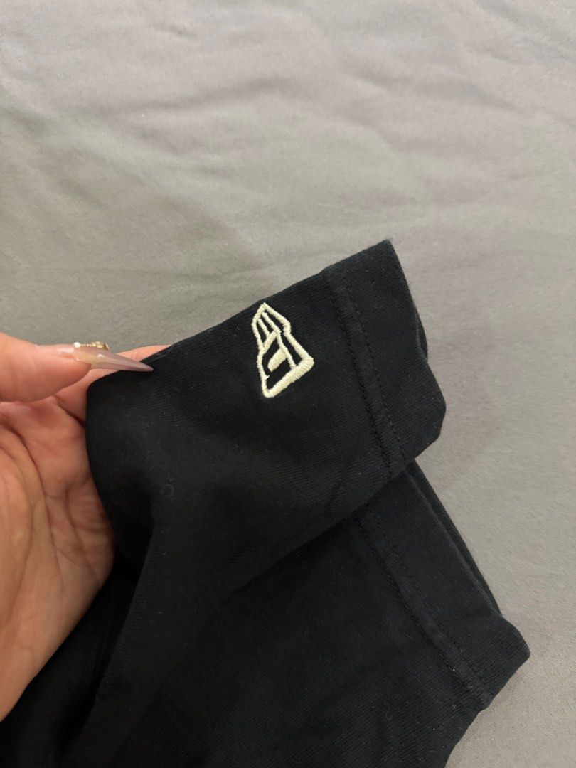 New Era x Yohji Yamamoto T-shirt - Small (Category: Tshirts & Polo Shirts) located in Singapore. Submitted by canshsm (Listing ID 1386639865, Image 3). Description: - Authentic/Not os - New Era x Yohji Yamamoto collaboration T-shirt - Black color - Size: Small - Features 'No Future' graphic on the back - New Era logo on sleeve - Perfect for fans!.