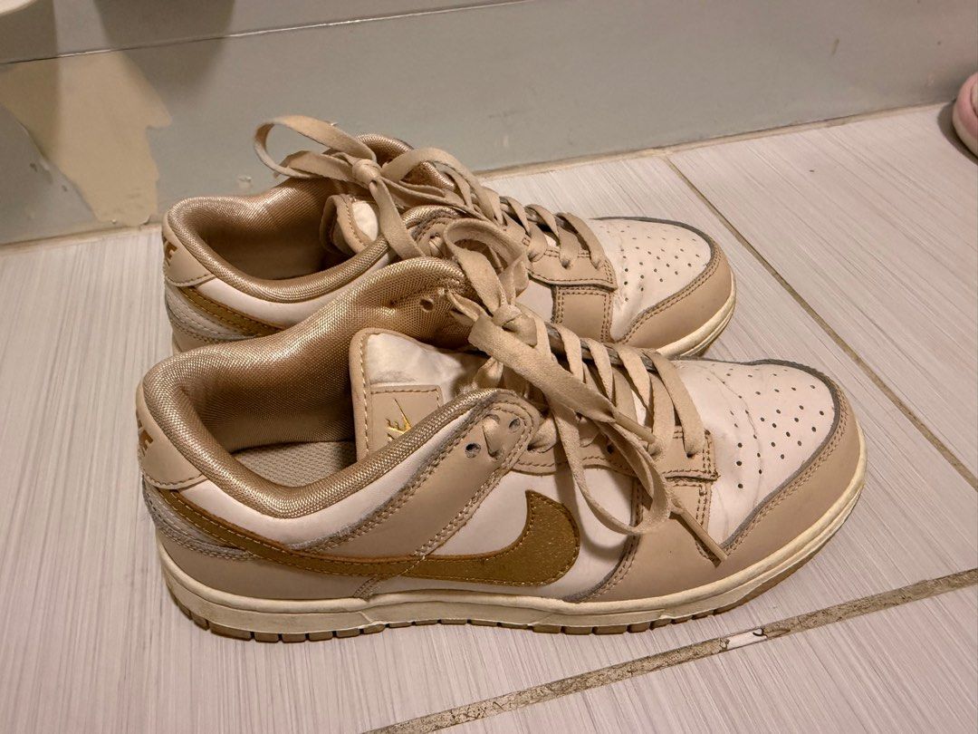 Nike Dunk Low Beige Gold Swoosh (Category: Sneakers) located in Mandaluyong City. Submitted by jujube0111 (Listing ID 1386775719, Image 1). Description: Bought in Japan, lightly used. No box.
