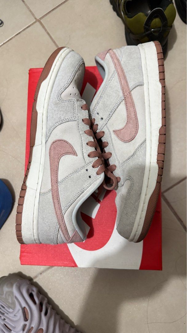 Nike Dunk Low Fossil Rose (Category: Sneakers) located in Manila. Submitted by offthehype (Listing ID 1386719060, Image 2). Description: Nike Dunk Low Fossil Rose Size 10 US Mens Without box 8.5/10 condition Just dirty No sole seps and heel drags Price is fixed Meetups: Weekends near pasig rotonda or arcovia Delivery via grab lalamove etc, fee by buyer..