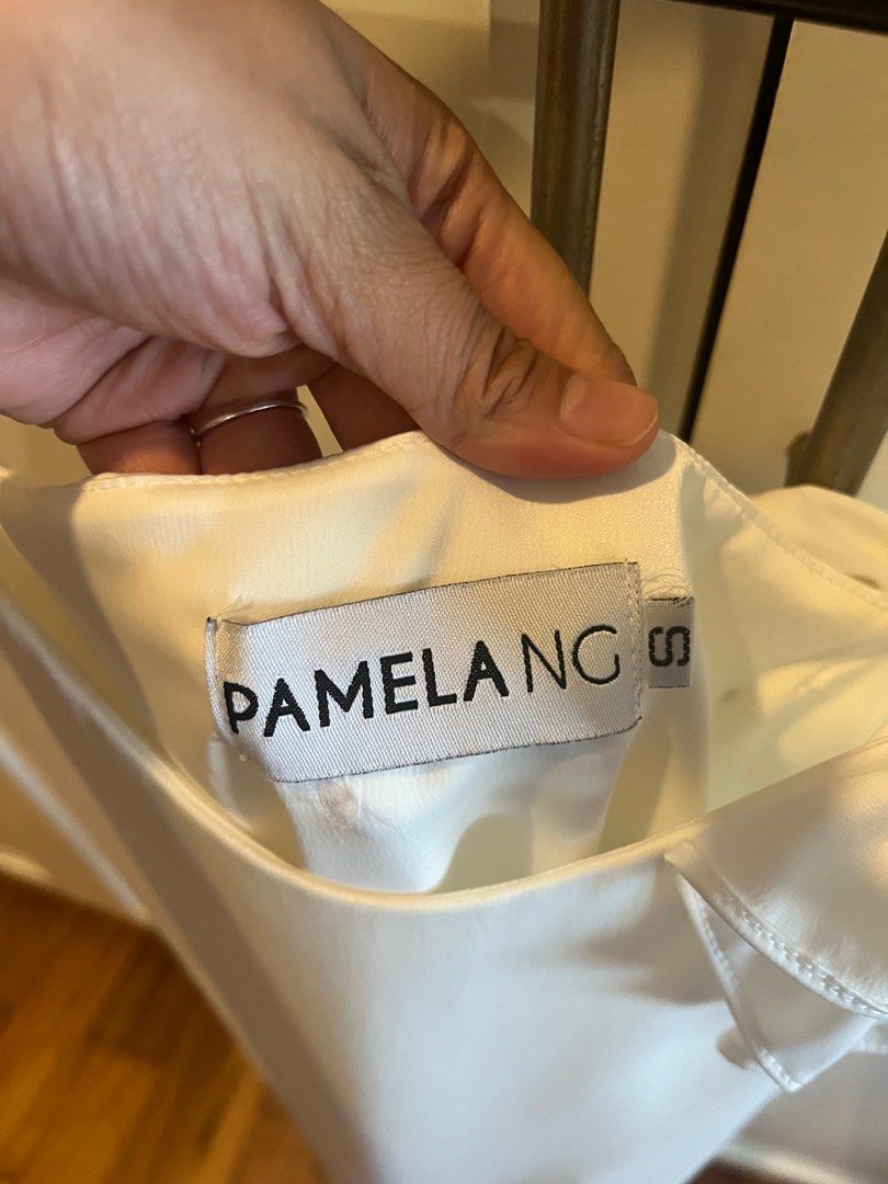 PAMELA NG WHITE DRESS (Category: Dresses) located in Manila. Submitted by leahdeclutters (Listing ID 1386665357, Image 2). Description: PAMELA NG designer white dress perfect for wedding/bridal parties. All-white parties .