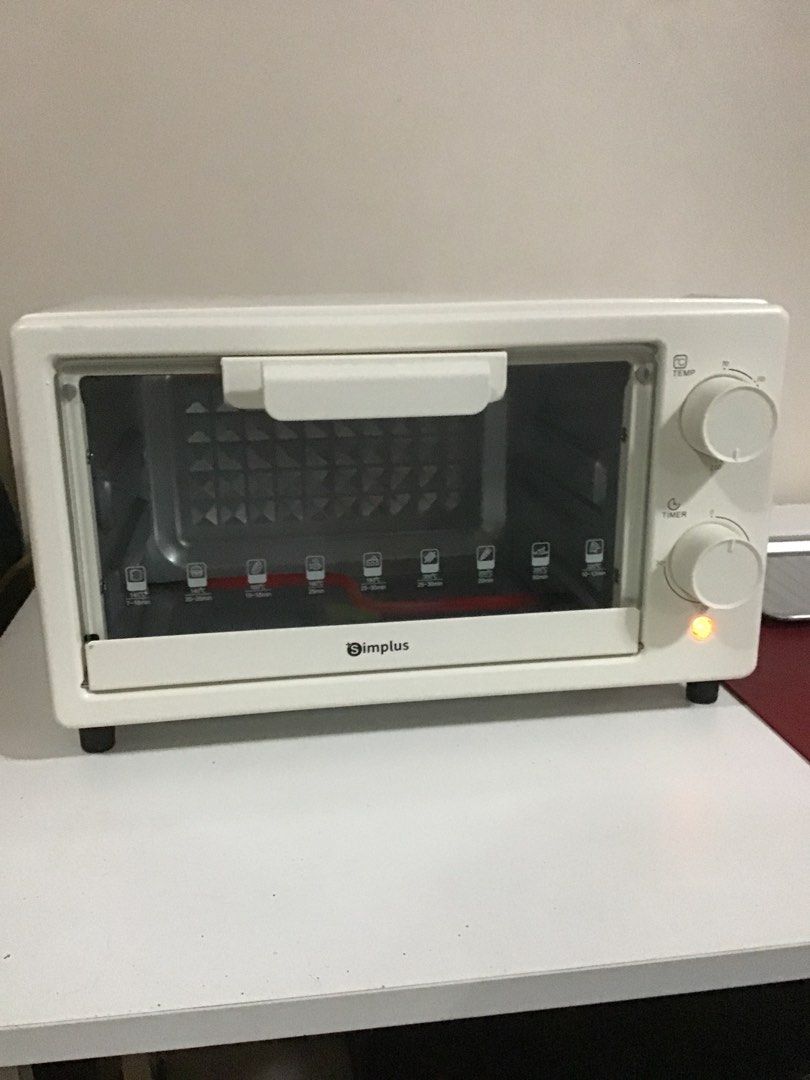 Electric Oven 12L SIMPLUS (Category: Bakeware) located in Pasig City. Submitted by crybbeee (Listing ID 1386698945, Image 1). Description: GOOD AS BRANDNEW WITH BOX RFS: Upgrading to convection oven Oven Features: Mechanical Control, Removable Trays Weight: 2.14kg Volume Capacity: 12L Input Voltage: 220V Power Consumption: 650W.