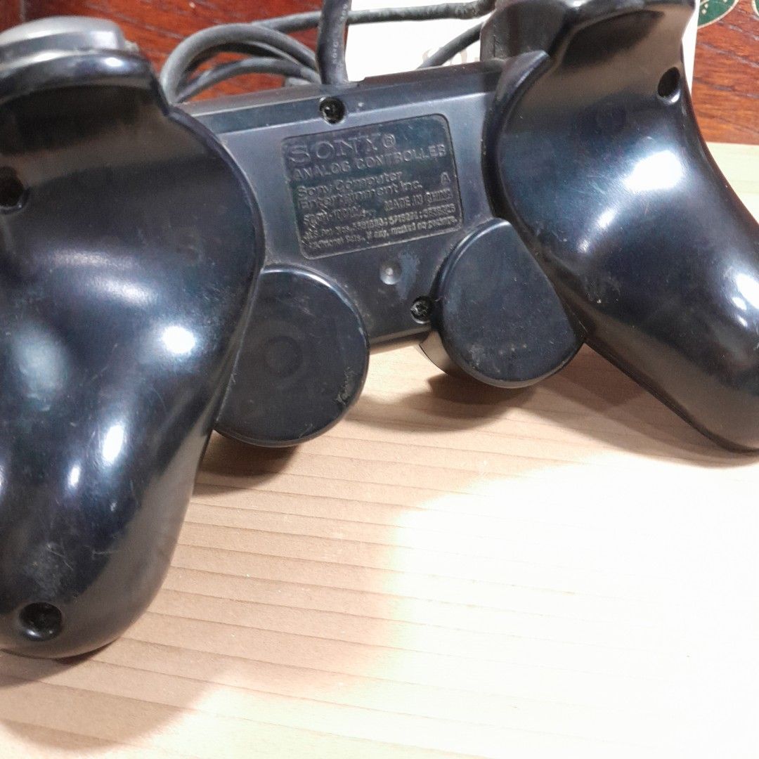 Sony PlayStation 2 DualShock 2 Controller (Category: Controllers) located in Las Pinas. Submitted by 84vintage (Listing ID 1386705656, Image 2). Description: Box#4 Sony PlayStation 2 DualShock 2 Controller Wired. See photos for condition. Working unit but the rubber padding needs replacement. Actual photos posted. Please examine them carefully as they are part of the description. --📌 MUST READ Before Dealing with us 📌-- ⚠️Price is posted. No lo