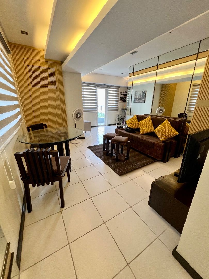 The Columns Ayala Avenue 1BR (Category: Apartments & Condos) located in Pasay City. Submitted by _russ_ (Listing ID 1112199114, Image 1). Description: 1br fully furnished and interior decorated unit approximately 52 sq.m. with balcony customized living room sofa bed 4 seater customized dining set 2 seater breakfast nook living room a/c 40 inch smart tv refrigerator microwave oven range hood electric stove granite finish kitchen top Vacuum cleaner